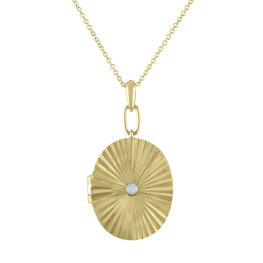 Yellow gold pleated oval locket with a small round opal in the center. 