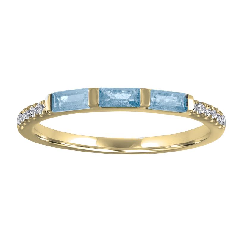 Yellow gold skinny band with three aquamarines baguettes and round diamonds on the shank. 