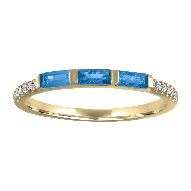 Yellow gold skinny band with three blue topaz baguettes and round diamonds on the shank. 