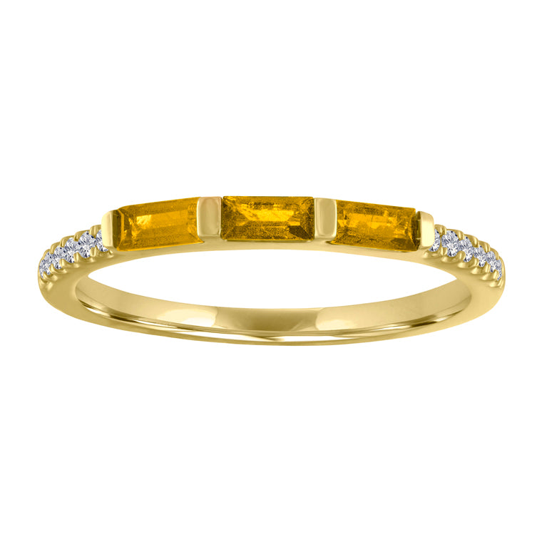 Yellow gold skinny band with three citrine baguettes and round diamonds. 