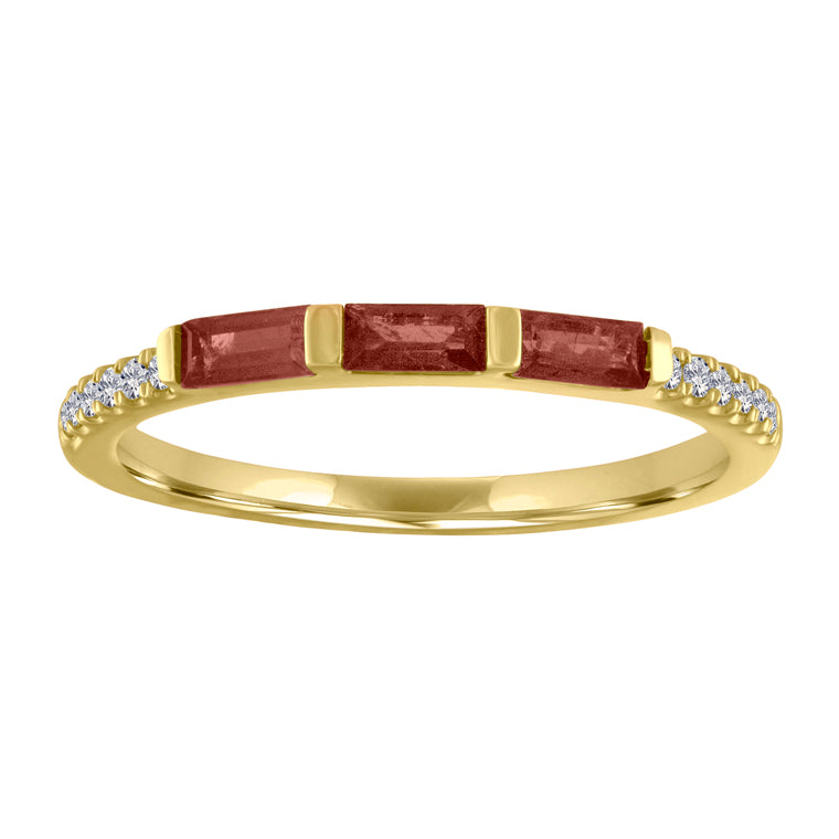Yellow gold skinny band with three garnet baguettes and round diamonds on the shank. 