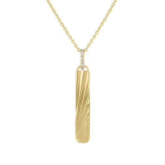 Yellow gold small fluted dogtag with a diamond bail. 