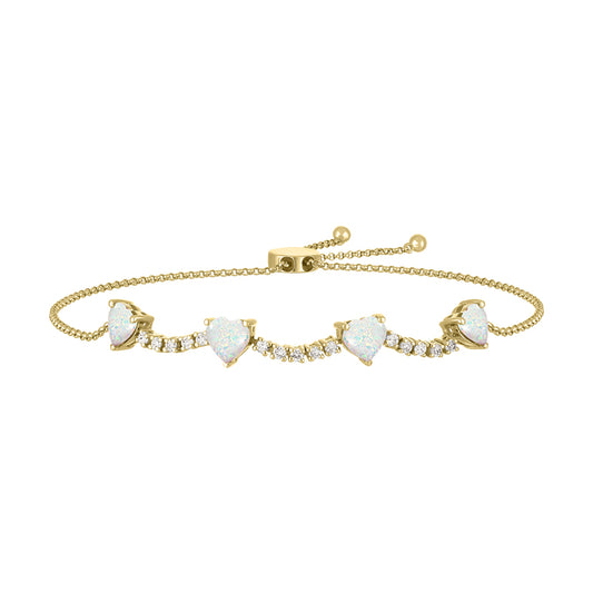 Yellow gold straight line bracelet with opal hearts and round diamonds.